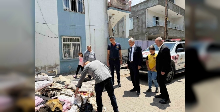 Başkan Hallaç, yangın mağduru aileyi yalnız bırakmadı